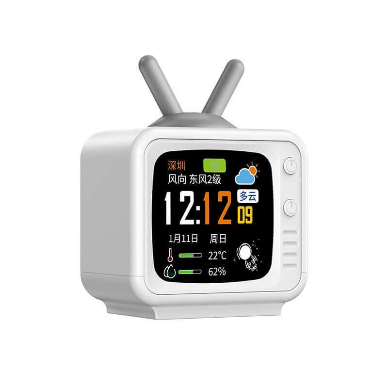 Cute digital alarm clock in white with a retro television design and weather display.