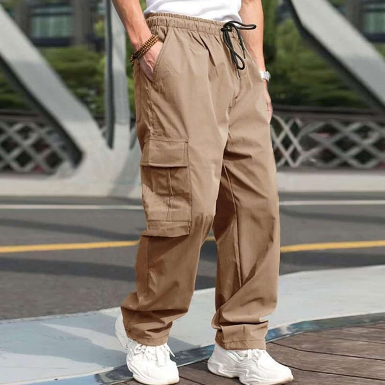 Men's casual cargo pants in khaki color, featuring loose straight fit, drawstring waist, and side pockets.